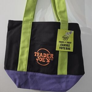 Trader Joe's Trick-or-Treat Mini Canvas Tote Bag in a black, purple, and green